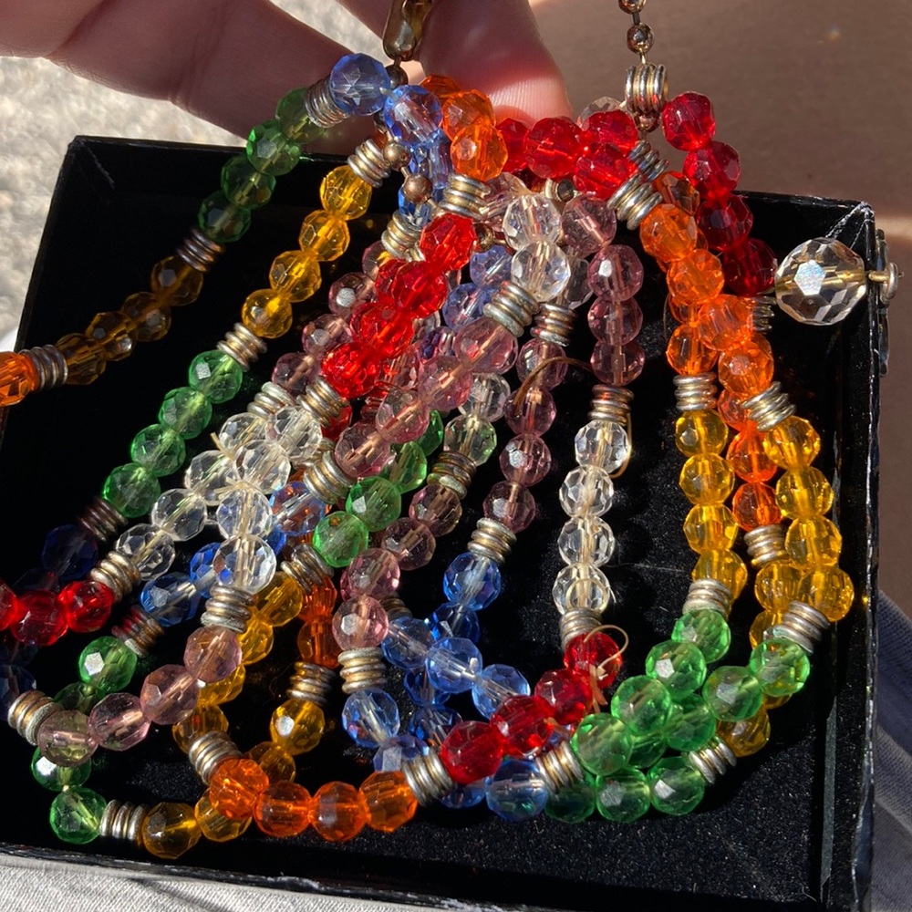 7 bracelets one has angel pendant